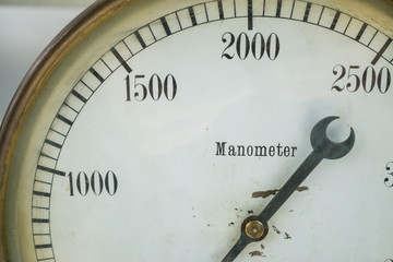 closeup shot of analog manometer equipment which measure pressure of gas or liquid test gauge big...