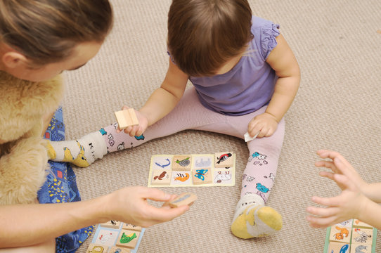 Daddy And Kids Playing Children's Lotto