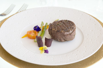 minimalistic dish steak with vegetables
