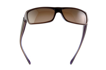 Dark brown glasses on a white background