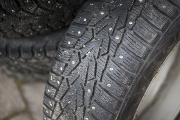 Winter tyre. Symbol with number tells how worn out the tyre is.