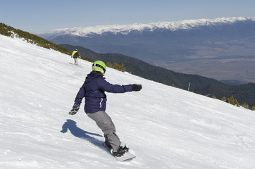 A snowboarder at Bansko, Bulgaria