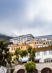 Fototapeta na wymiar Clouds over Gibraltar Buildings