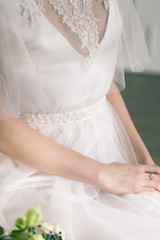 Bride. Young women with wedding dress in very bright room, some