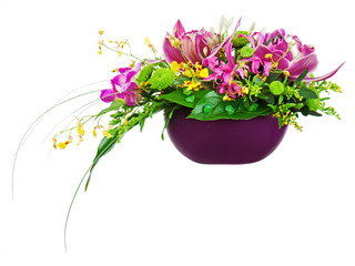 Colorful flower bouquet arrangement centerpiece in vase isolated on white background.Closeup.