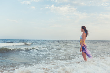 Woman on the sea shore