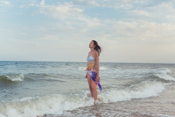 Fototapeta premium Brunette on the beach