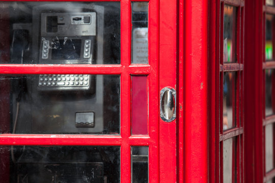 Telephone Box Detail / Closeup of red phone box door and window