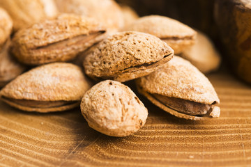 Heap of almond nuts in shell
