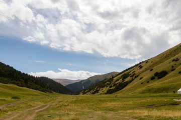 Fototapeta na wymiar valley road in the mountains