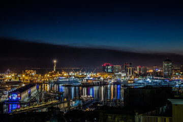 Fototapeta na wymiar GENOA, ITALY, OCTOBER 19, 2015: Night view of the city of Genoa, Italy/ Genoa landscape/ Genoa Skyline
