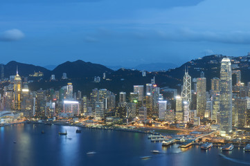 Fototapeta na wymiar Panorama of Victoria Harbor of Hong Kong city at dusk