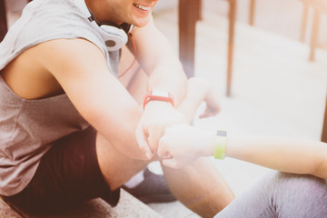 Young athletic people greeting each other after a workout.