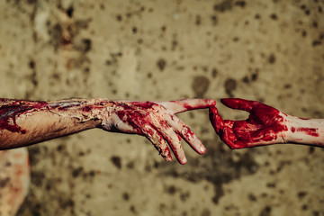 Two bloody zombie hands
