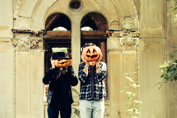 halloween couple with pumpkin