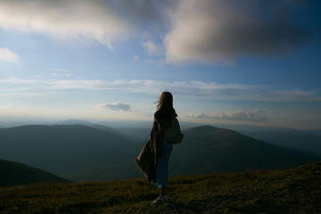 Pretty girl hiker with backpack