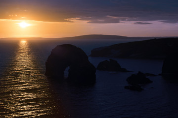 Fototapeta na wymiar beautiful sunset over the virgin rock