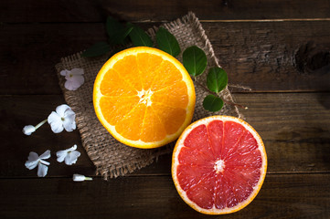 Citrus set. Oranges and grapefruit on a wooden table. Top view. Flat lay.