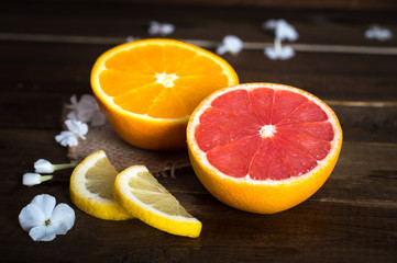 Citrus set. Oranges, lemons and grapefruit on a wooden table. Top view. Flat lay.