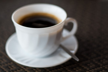 Cup of instant coffee on a table at restaurant