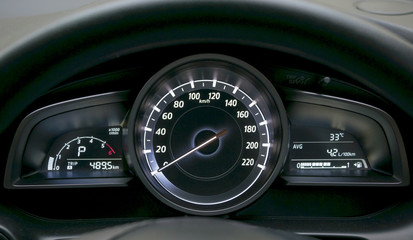 Close up of car dashboard and Odometer.