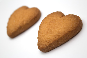 Two cookies in the form of hearts - symbol of love