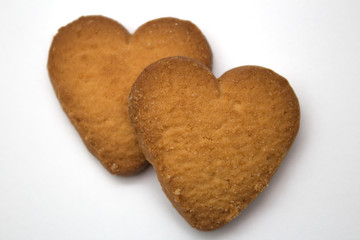 Two cookies in the form of hearts - symbol of love