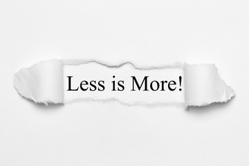 Less is More! on white torn paper