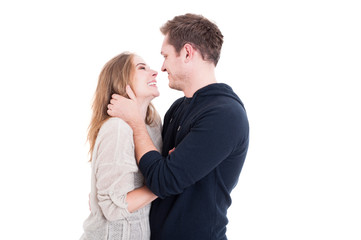 Happy couple cuddling and being affective