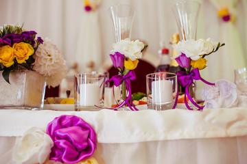 The decorations are  on the wedding table