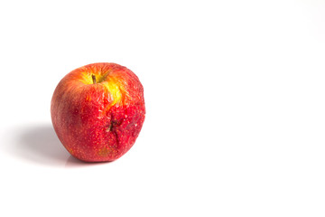 Wizen apple presented as old aging skin