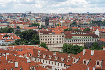 Fototapeta na wymiar Panoramic view of Prague from castle point on cloudy day in summer