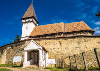 Fototapeta premium Mesendorf fortified church in a traditional saxon village in Transylvania, Romania