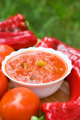 Hot peppers in tomato sauce with herbs and garlic
