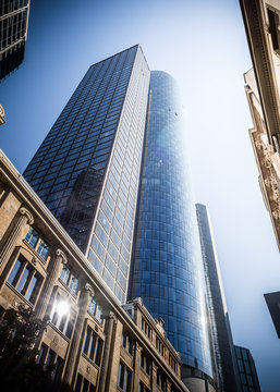 Main Tower Frankfurt, skyscraper view from low angle with sunbeam, Frankfort, germany