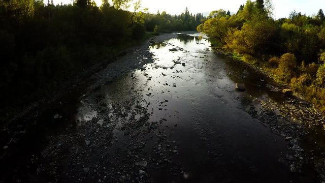 aerial shot of Green Valley during with River, autumn in Bieszczady, Poland