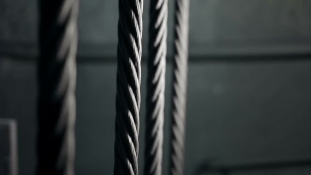 Four elevator hoist metal ropes stopping, mine shaft lifting system