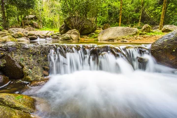 Tuinposter The landscape photo, Thailand Waterfall, beautiful waterfall in forest, Chiang rai province, Thailand © noombluesman