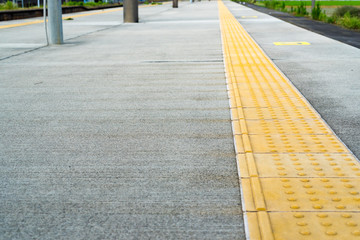 Tactile paving for blind person.