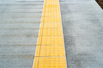Tactile paving for blind person.