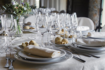 glasses and table set in restaurant