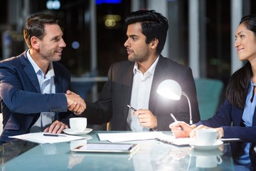 Businessman shaking hands with a colleague
