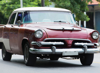 Plakat Red American Classic car on street in Havana Cuba