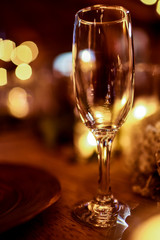 Crystal glass stands on the wooden table
