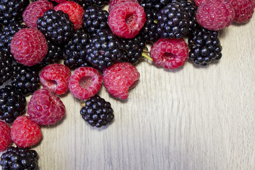 fresh berries on the wooden table