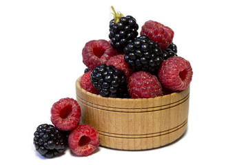 fresh berries on the wooden bowl