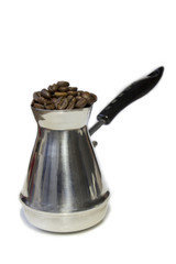 coffe beans in a mag isolated on white