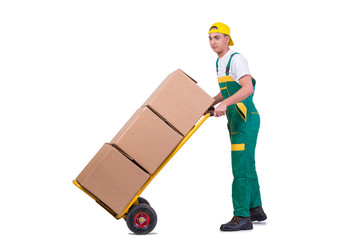 Young man moving boxes with cart isolated on white