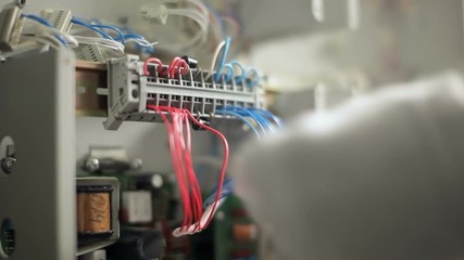 Technician Insert wire in circuit connector, power cage clamp