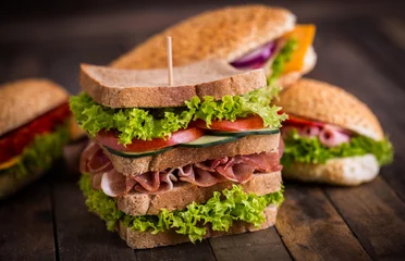 Zelfklevend Fotobehang Sandwiches with ham and cheese © pilipphoto